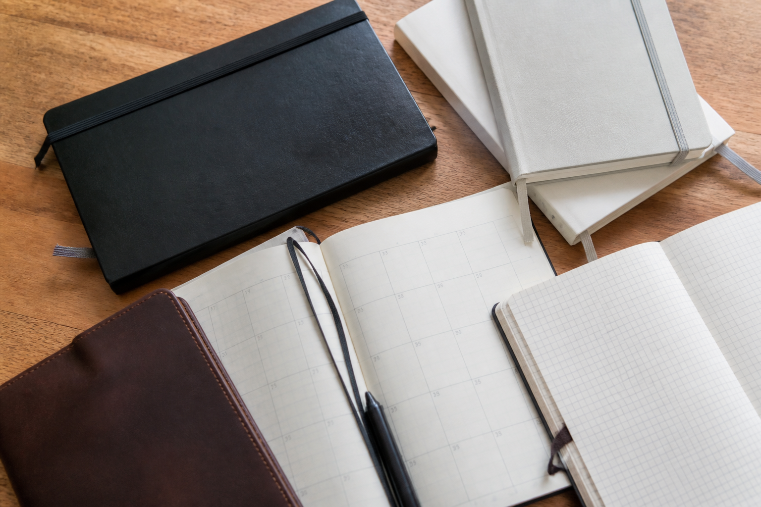 Papieren planners en notitieboekjes